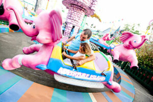 Adventure Island father and daughter on ride