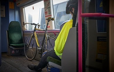 cyclist on c2c train