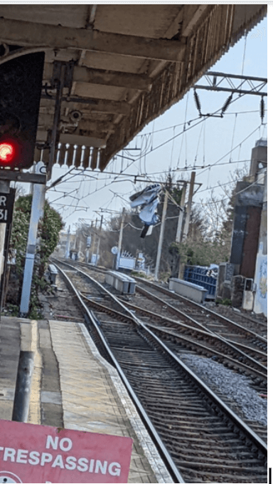 Banner caught in overhead lines