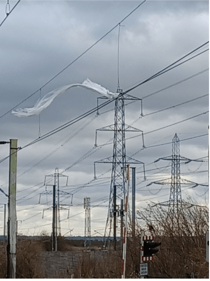 Plastic wrapping caught in overhead lines